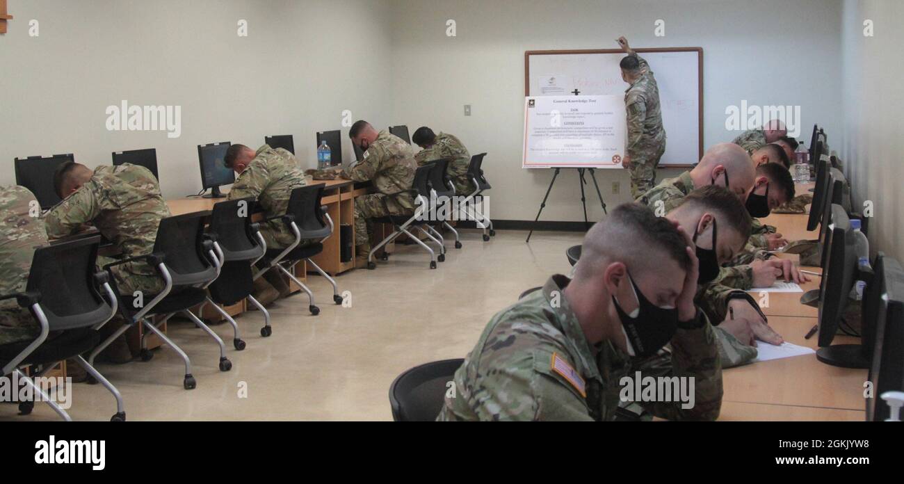 Soldiers take a general knowledge exam during the Eighth Amy 2021 Best Warrior Competition at Camp Casey, South Korea, on May 9, 2021. The general knowledge exam consists of 50 questions testing the competitors’ ability to recall and respond to general Soldier knowledge topics. Stock Photo