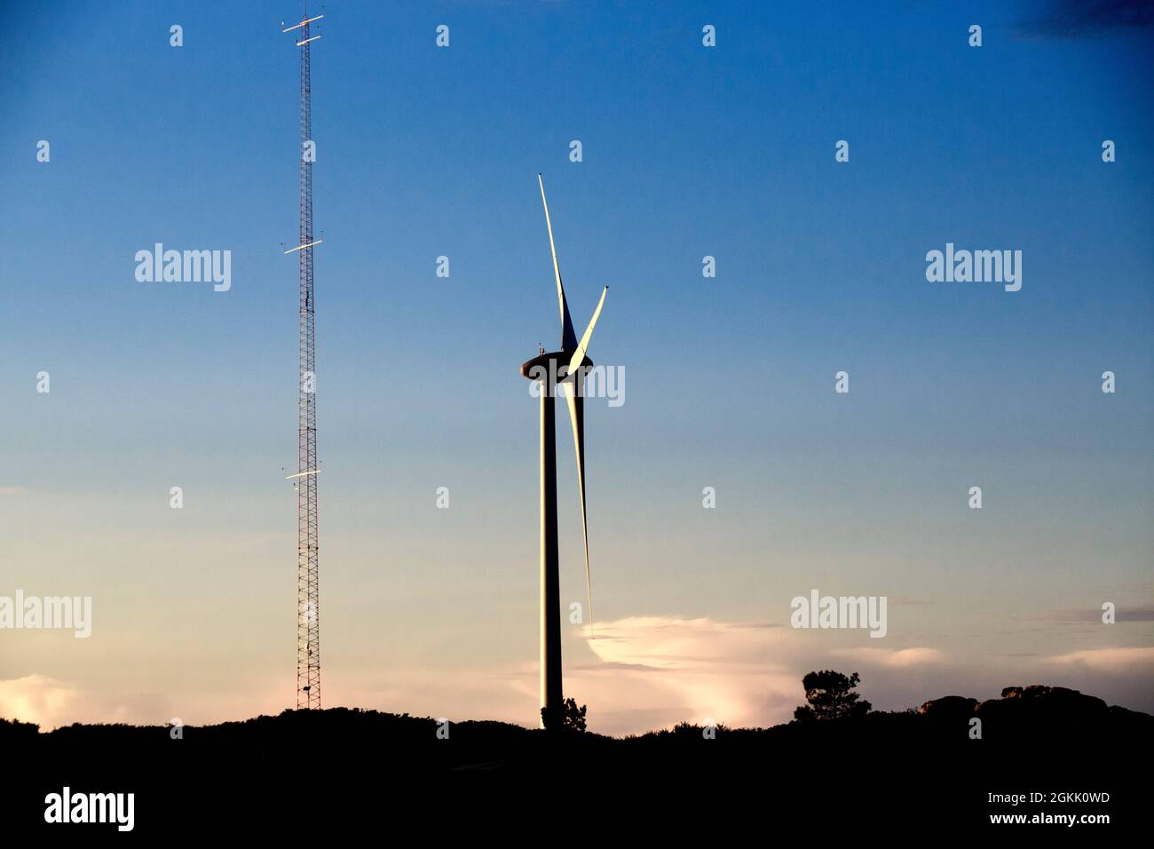 wind turbines silhouette on mountain at the sunset Stock Photo - Alamy