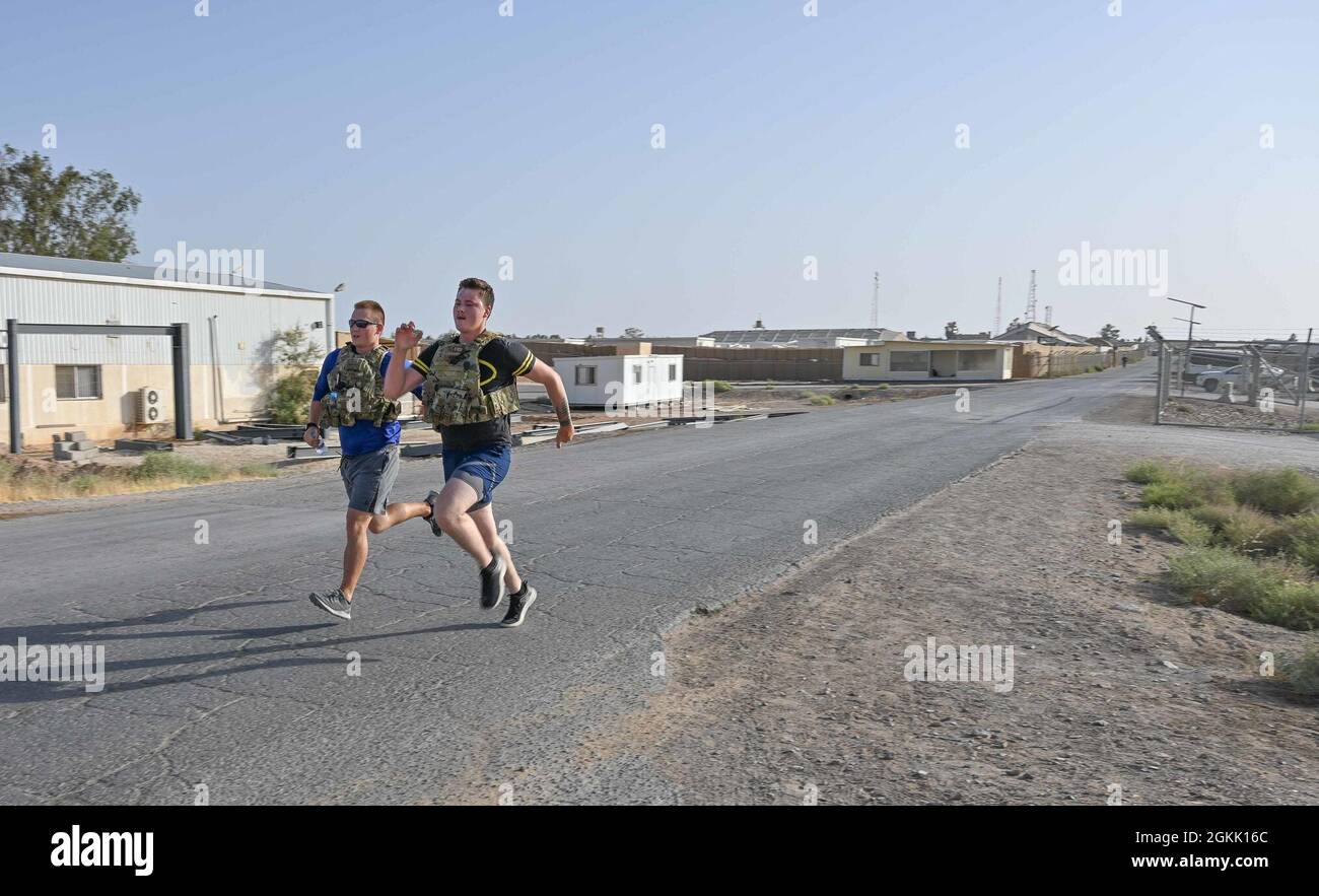 Two Security Forces Airmen assigned to the 332nd Air Expeditionary Wing ...