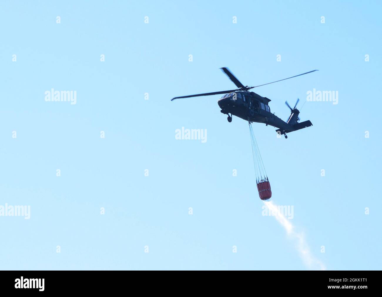 One CH47 Chinook and two UH60 Black Hawk helicopters conduct water
