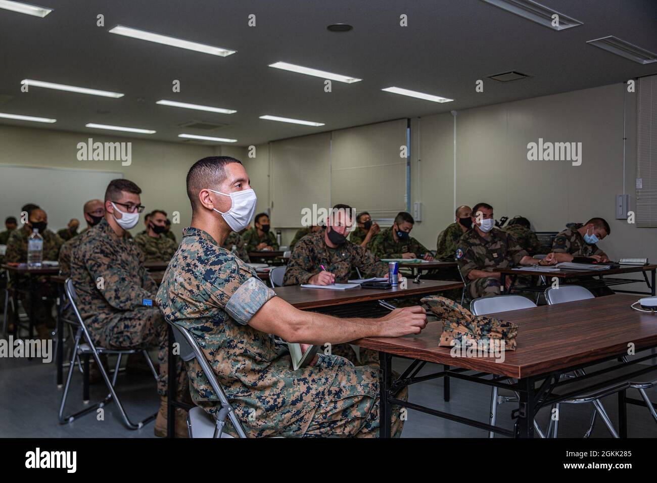 U.S Marine Capt. Christopher Ramos translates a brief during the staff ...