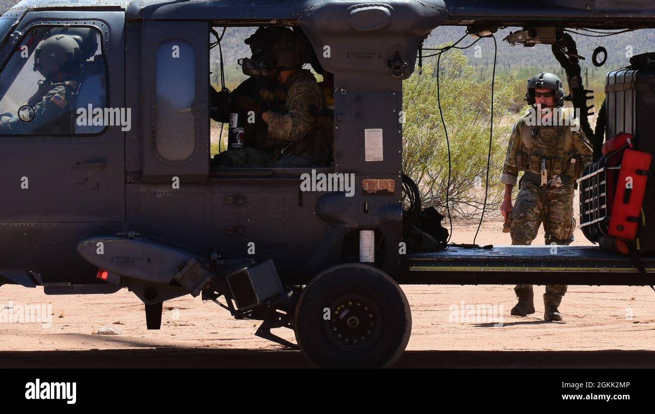 U.S. Air Force Airmen assigned to the 55th Rescue Squadron prepare for ...