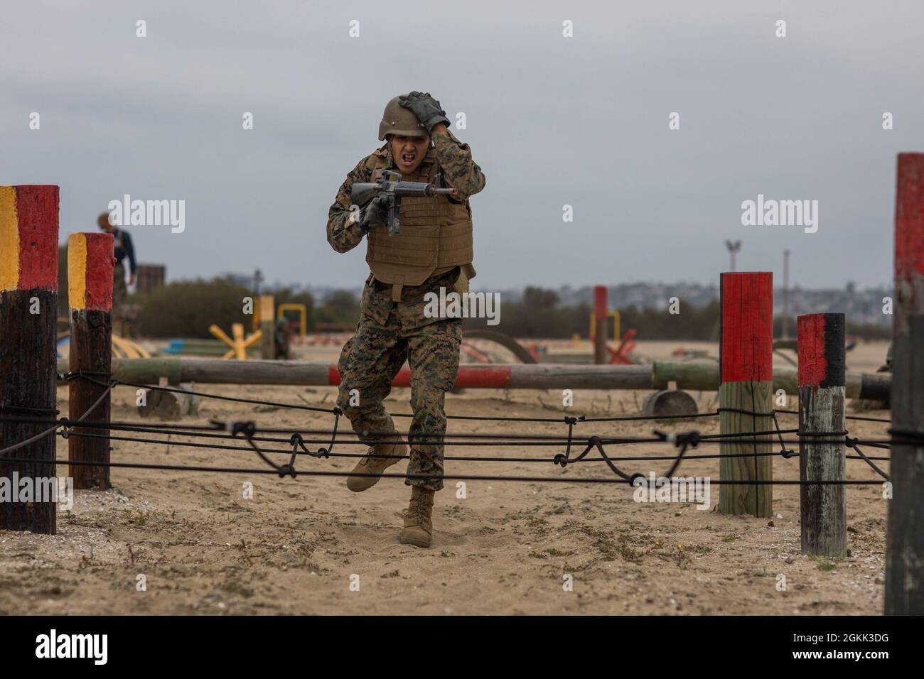 Recruit Eric Hernandez, a recruit with Mike Company, 3rd Recruit Training Battalion, participates in the Bayonet Assault Course at Marine Corps Recruit Depot, San Diego, Calif., May 11, 2021. Hernandez is from Chicago, Illinois and was recruited out of RS Chicago. Stock Photo