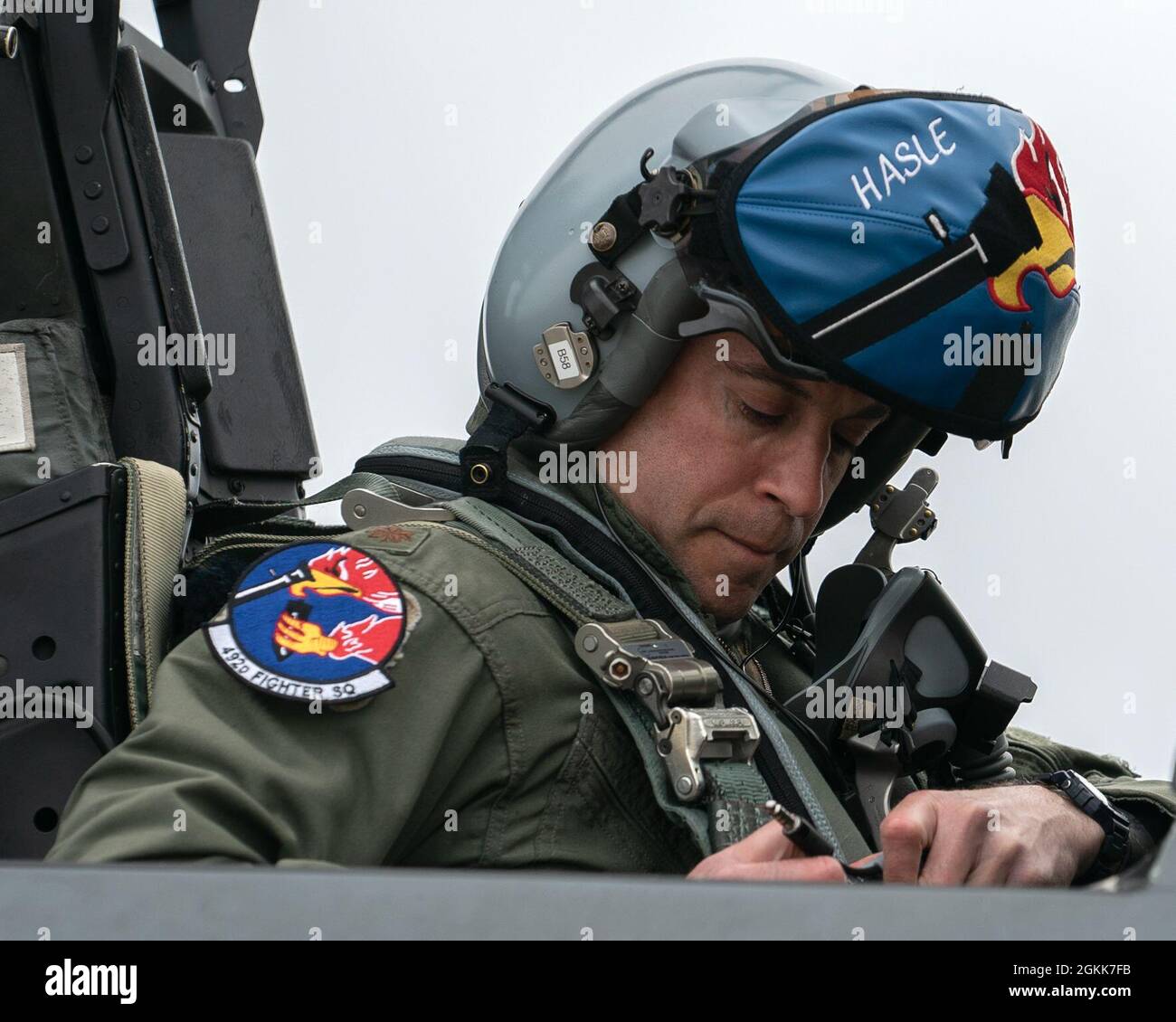 A U.S. Air Force pilot assigned to the 492nd Fighter Squadron conducts pre-flight checks during surge operations at Royal Air Force Lakenheath, England, May 13, 2021. Surge operations provide aircrew and support personnel the opportunity to hone the skills necessary to maintain a ready force, capable of ensuring the collective defense of the U.S., U.K. and the NATO alliance. Stock Photo