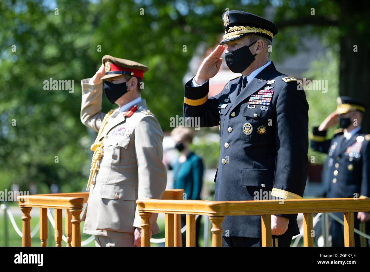Chief of Staff of the U.S. Army Gen. James C. McConville and General Sir Mark Alexander Carleton-Smith, the chief of the General Staff of the British Army, render honors during an Army Full Honor Arrival Ceremony at Whipple Field, Joint Base Myer-Henderson Hall, Arlington, Va., May 13, 2021. Stock Photo