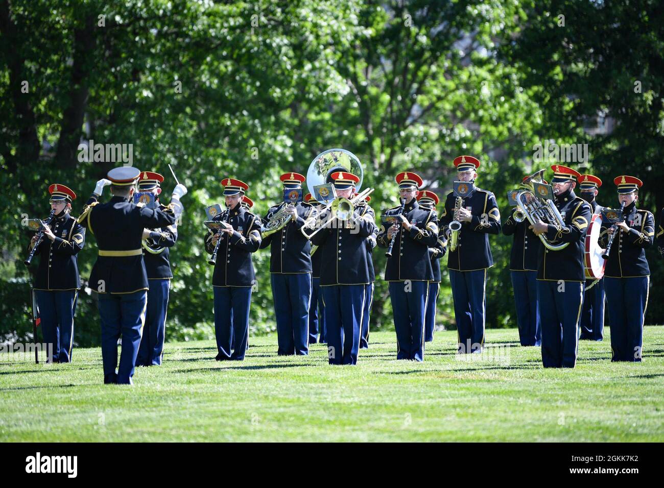 U.S. Soldiers assigned to the U.S. Army Band 'Pershing's Own' participate in an Army Full Honor Arrival Ceremony welcoming General Sir Mark Alexander Carleton-Smith, the chief of the General Staff of the British Army, at Whipple Field, Joint Base Myer-Henderson Hall, Arlington, Va., May 13, 2021. Chief of Staff of the U.S. Army Gen. James C. McConville hosted the event. Stock Photo