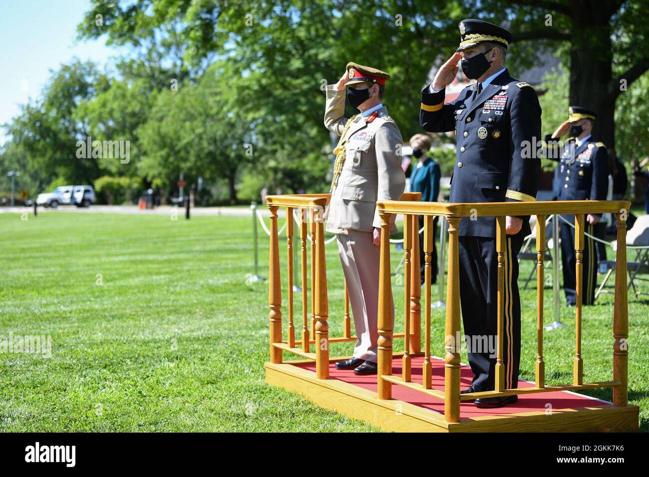Chief of Staff of the U.S. Army Gen. James C. McConville and General Sir Mark Alexander Carleton-Smith, the chief of the General Staff of the British Army, render honors during an Army Full Honor Arrival Ceremony at Whipple Field, Joint Base Myer-Henderson Hall, Arlington, Va., May 13, 2021. Stock Photo
