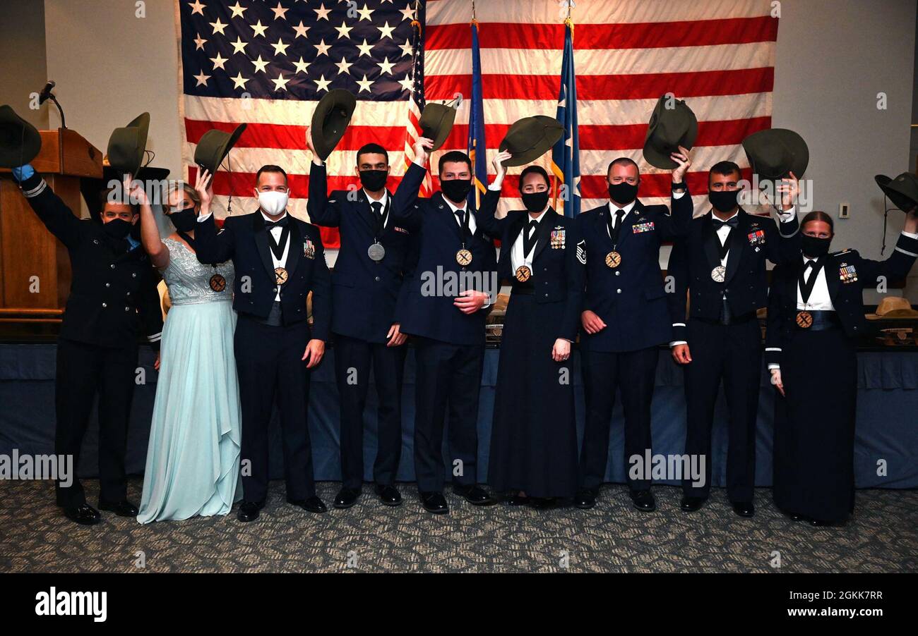 Air Force Special Operations Command’s 2020 Outstanding Airman of the Year pose for a photo at the conclusion of the AFSOC OAY banquet at Hurlburt Field, Florida, May 13, 2021. AFSOC formally recognized 2020’s OAY winners with a base tour, a medallion breakfast and the formal banquet. Stock Photo