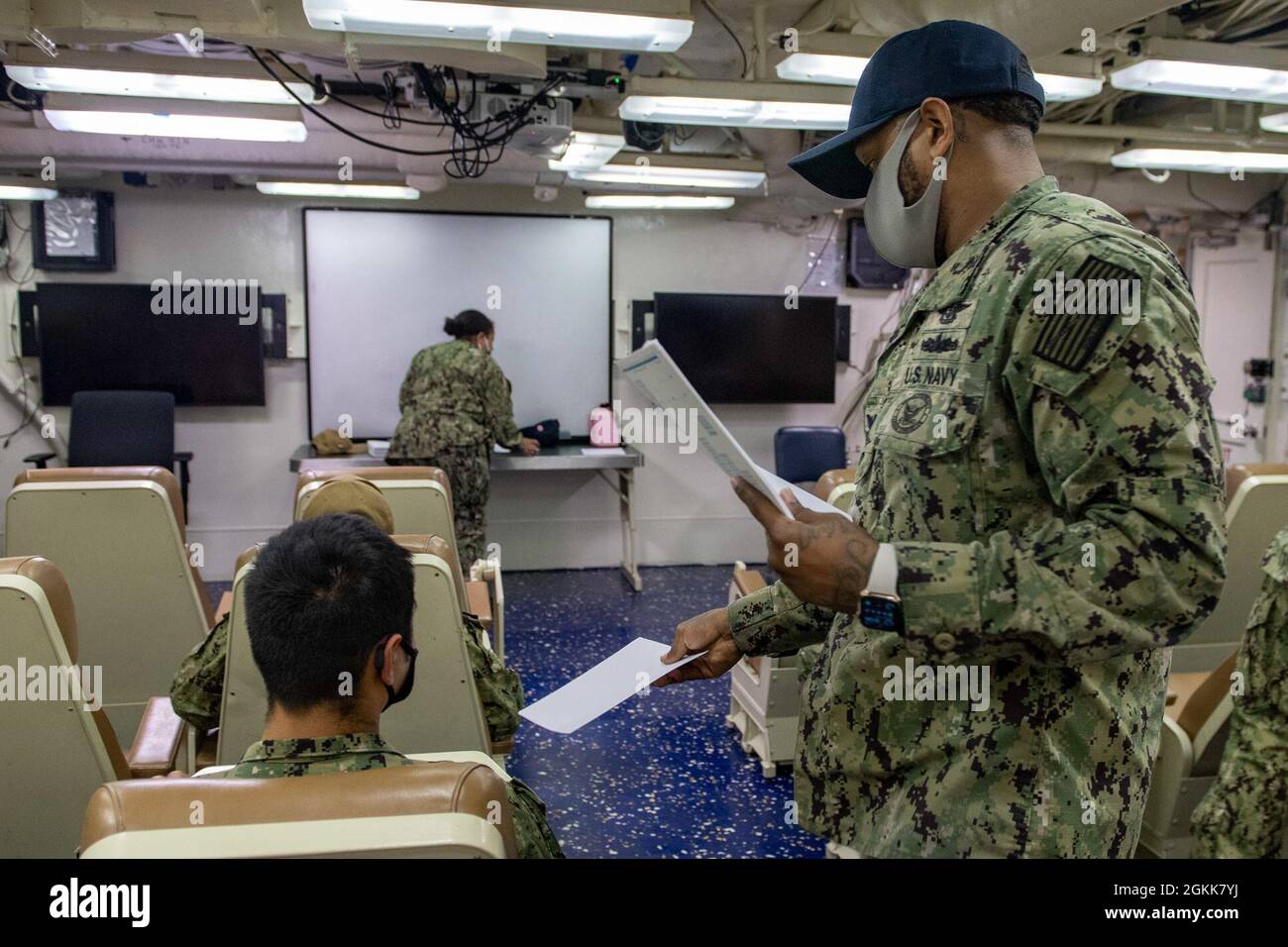 210513NBT6812002 SASEBO, Japan (May 13, 2021) Sailors aboard the
