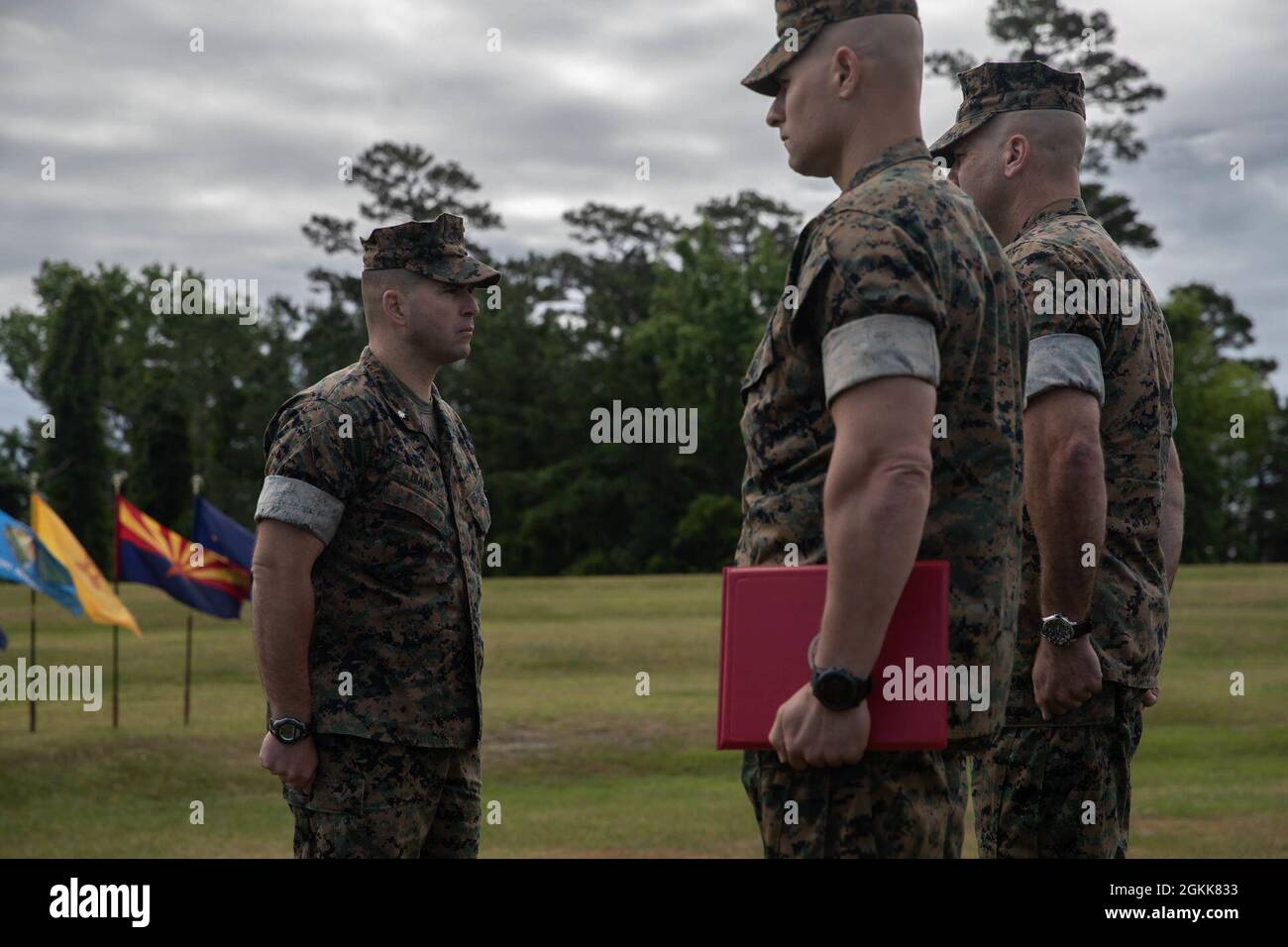 U.S. Marine Corps Lt. Col. Gabriel Diana, a native of Columbus, Ohio, the outgoing commanding officer, 1st Battalion, 2d Marine Regiment (V12), 2d Marine Division, receives an award at a change of command ceremony on Camp Lejeune, N.C., May 13, 2021. During the ceremony, Diana relinquished command of V12 to Lt. Col. Aaron Awtry. Stock Photo