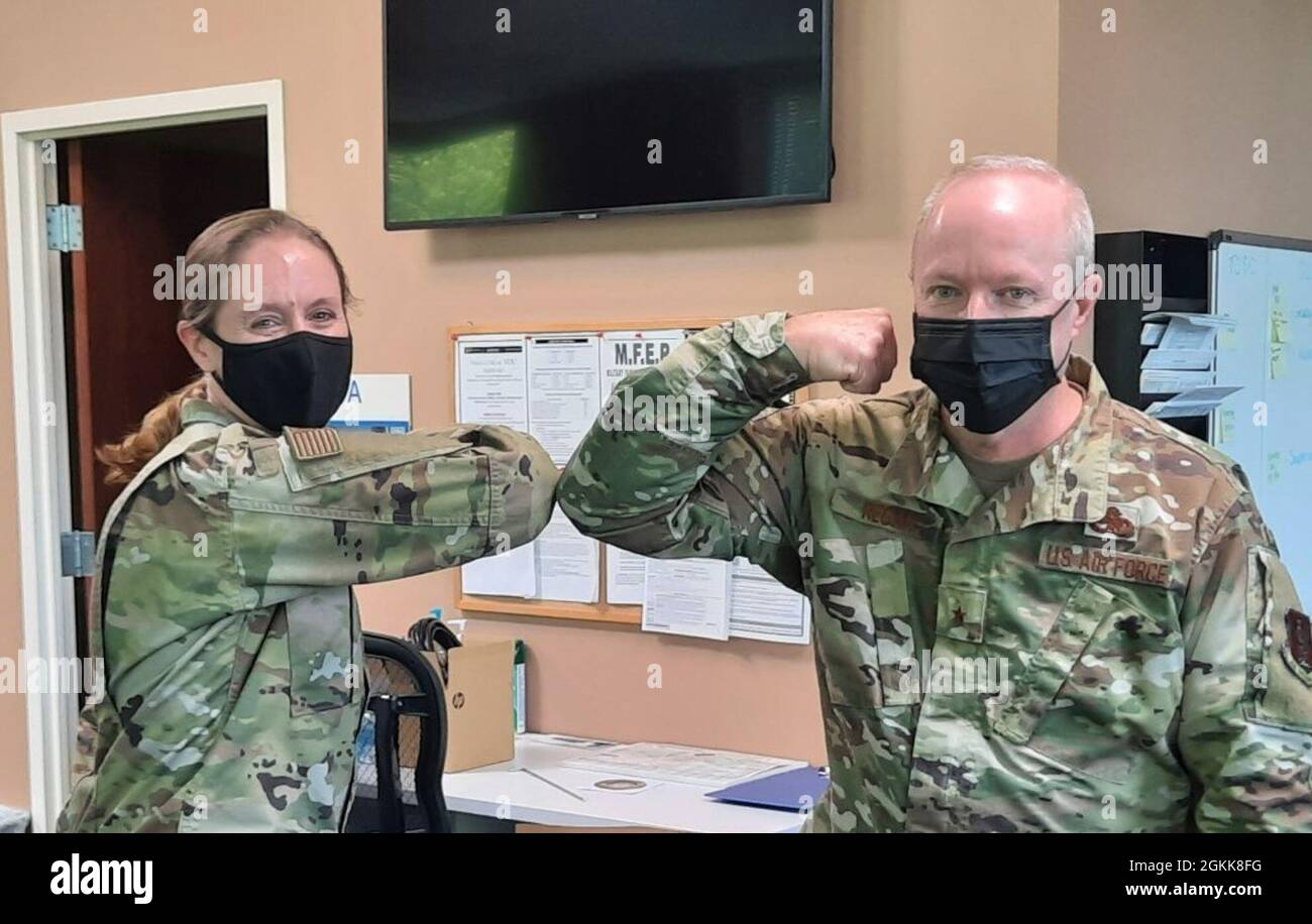 Brig. Gen. Michael Regan, right, deputy adjutant general Air and