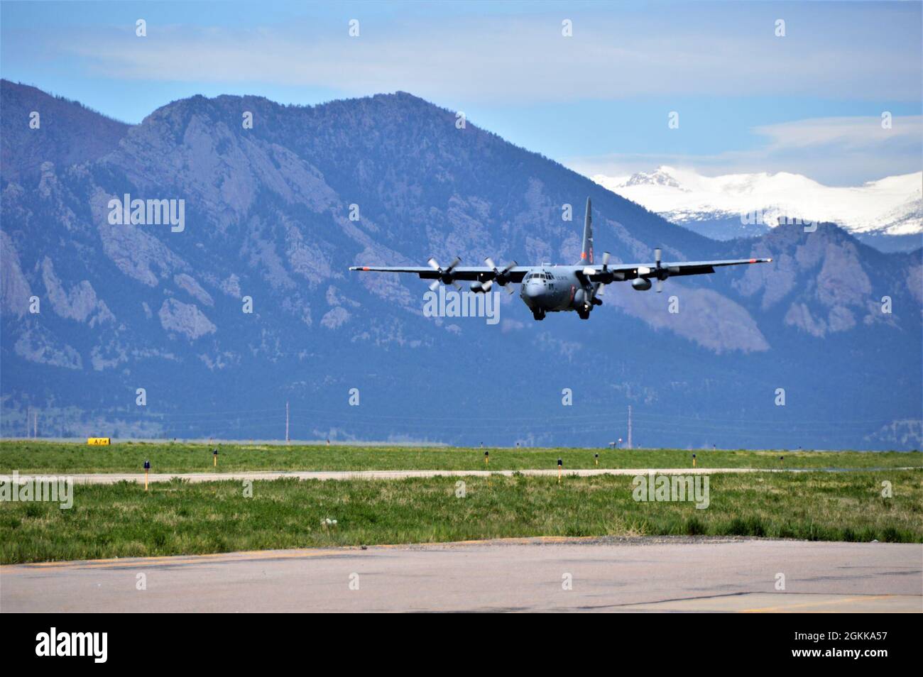 JEFFCO AIRTANKER BASE, Colo. --  A C-130 Hercules aircraft from the 302nd Airlift Wing lands after completing its training mission. The 302nd Airlift Wing is in Jefferson County, Colo., conducting annual aerial Wildland Firefighting (WFF) training and certification with the U.S. Department of Agriculture's Forest Service, using the USDA Forest Service-provided Modular Aerial Fire Fighting System (MAFFS) fixed aboard C-130 Hercules aircraft. Along with Cheyenne's 153rd Airlift Wing, the units are conducting training drops with potable water over national forests and Bureau of Land Management la Stock Photo