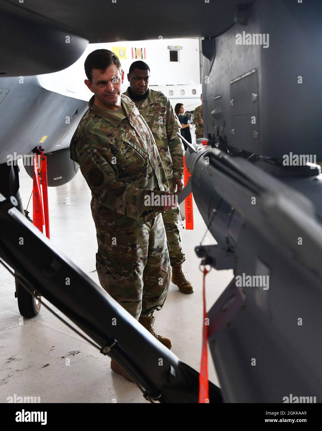 U.S. Air Force Lt. Gen. Micheal Loh, director, Air National Guard NG), looks at an MQ-9 Reaper, assigned to the 147th Attack Wing, Texas National Guard, May 14, 2021 at Ellington Field, Houston, Texas. While visiting the unit, Loh received mission briefings and discussed ANG initiatives with wing leadership. A Stock Photo