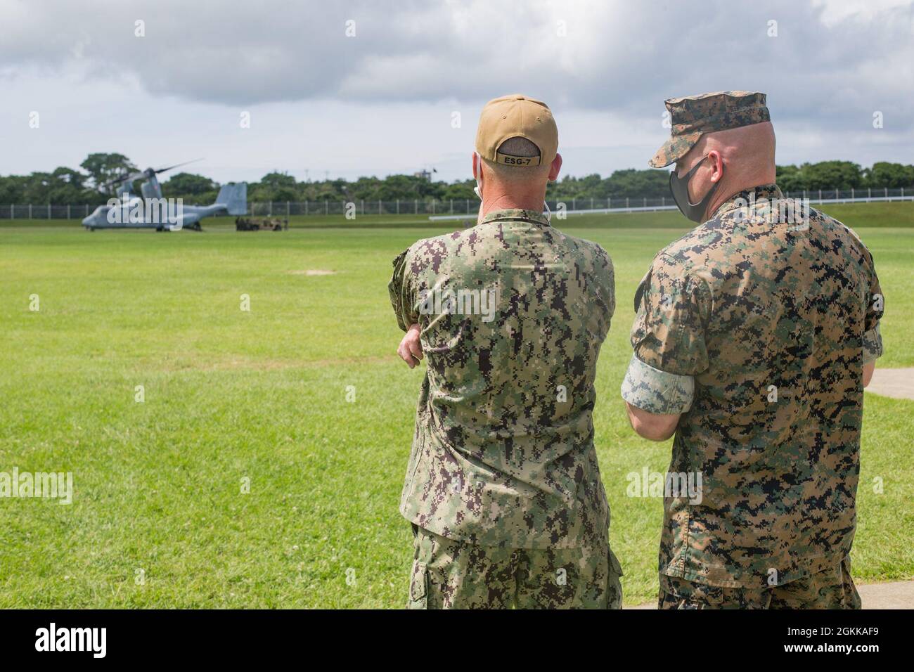 U.S. Navy Rear Adm. Chris Engdahl, commander of Expeditionary Strike Group (ESG) 7, Task Force (CTF) 76, meets with U.S Marine Corps Col. Michael Nakonieczny, commander of 31st Marine Expeditionary Unit (MEU), on Camp Hansen, Okinawa, Japan, May 14, 2020. The 31st MEU, the Marine Corps’ only continuously forward-deployed MEU, provides a flexible and lethal force ready to perform a wide range of military operations as the premier crisis response force in the Indo-Pacific region. Stock Photo