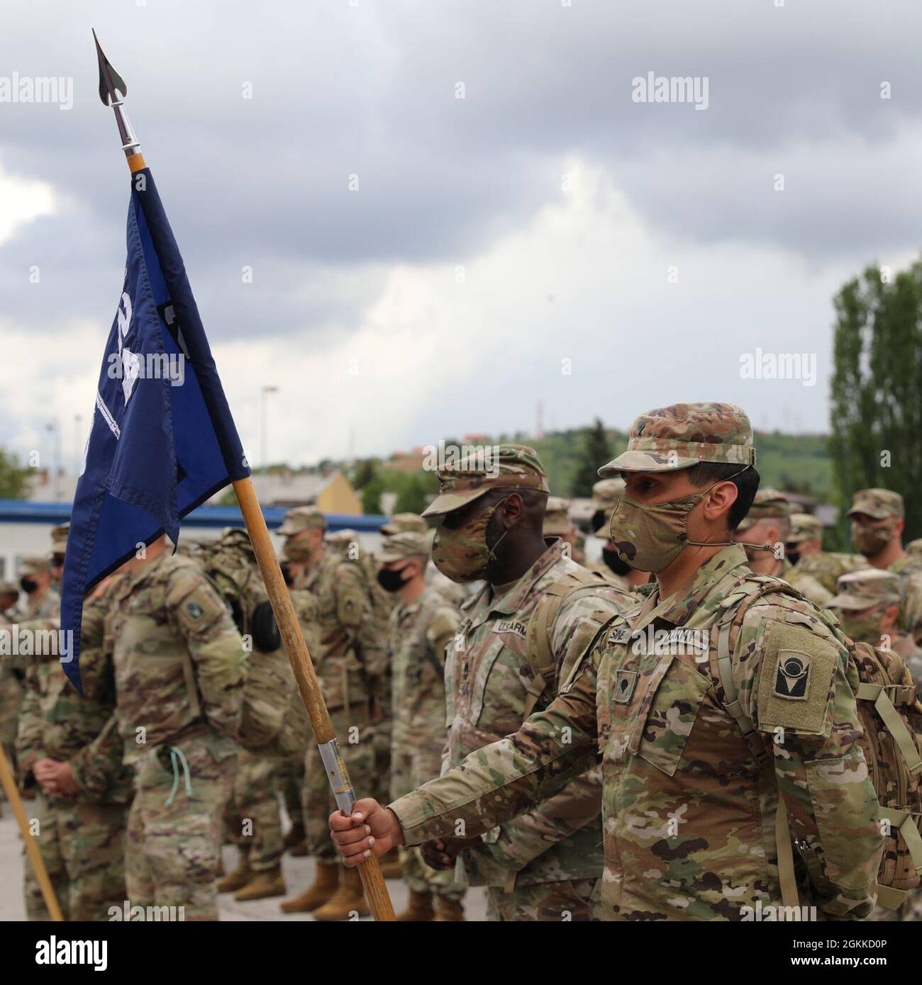 Soldiers from the Florida Army National Guard’s 2nd Battalion, 124th Infantry Regiment, 53rd Infantry Brigade Combat Team, stand in formation and display their guidon after arriving in Sarajevo, Bosnia and Herzegovina (BiH), May 15, 2021. Immediate Response 21 is a logistics-focused exercise designed to test and improve moving forces and equipment rapidly from one location to another by both BiH Armed Forces and U.S. Armed Forces. Immediate Response 21 is part of DEFENDER-Europe 21, an extensive multinational exercise designed to ensure that U.S. forces and participating NATO forces are traine Stock Photo