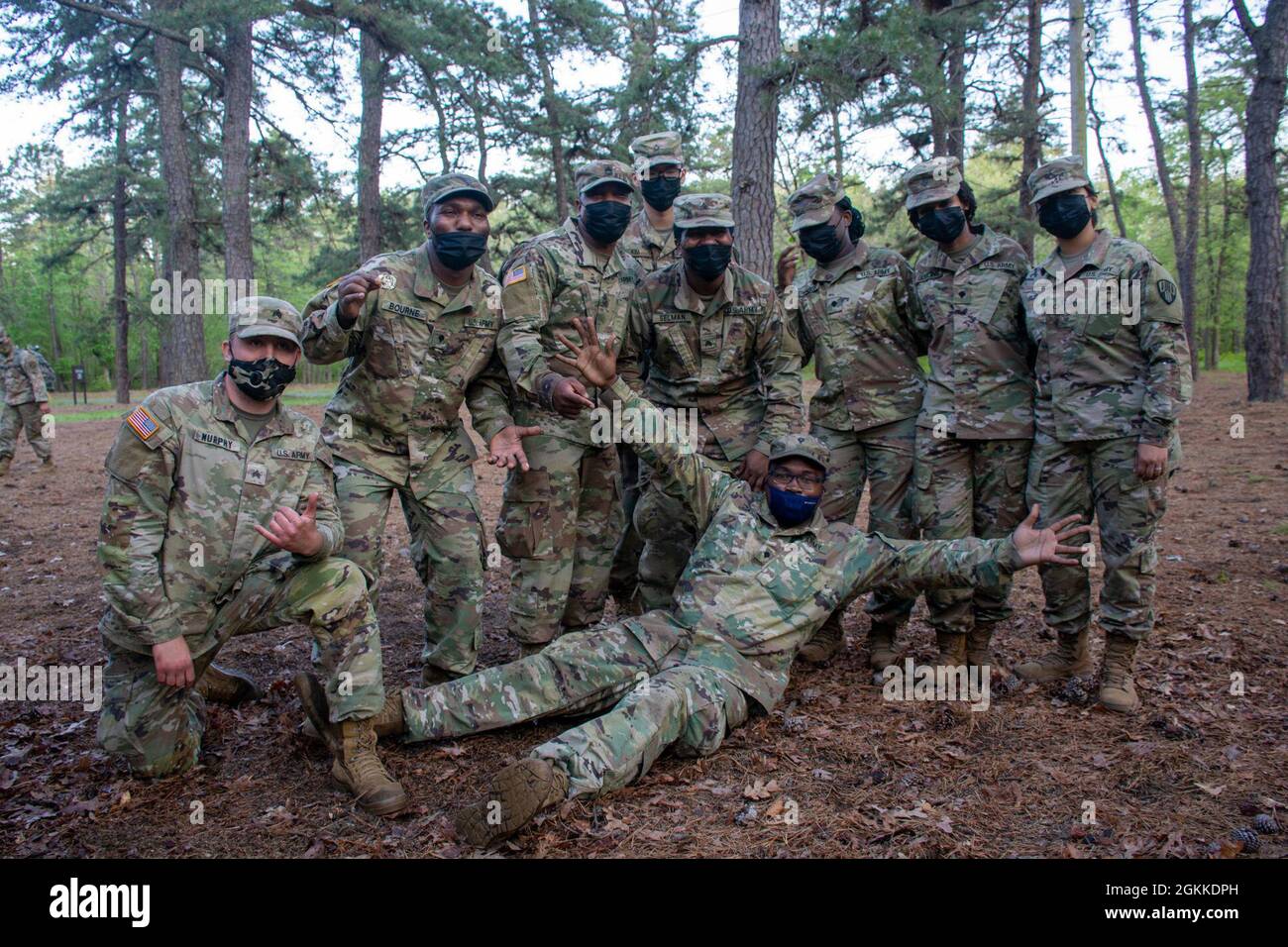 New York Army National Guard Soldiers assigned to the 101st Expeditionary Signal Battalion pose for a photo after training for the Philip A. Connelly Competition at Joint Base McGuire-Dix-Lakehurst, N.J., May 15, 2021. The Philip A. Connelly competition provides recognition for excellence in the preparation and serving of food in Army troop dining facilities and during field kitchen operations. Stock Photo