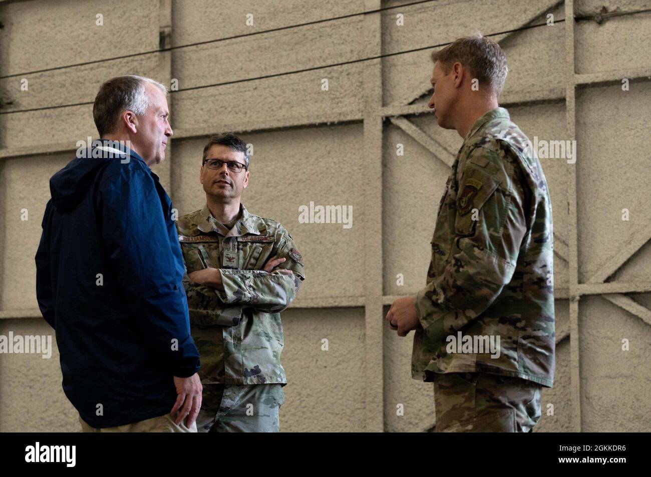 U.S. Sen. Dan Sullivan, left, talks to Air Force Col. Stuart Williamson, the 354th Mission Support Group commander, and Chief Master Sgt. John Lokken, the 354th Fighter Wing command chief, during a leadership visit on Eielson Air Force Base, Alaska, May 15, 2021. Sullivan serves on four senate committees vital to Alaska: the Commerce, Science and Transportation Committee, the Armed Services Committee, the Environment and Public Works Committee, and the Veterans' Affairs Committee. Stock Photo