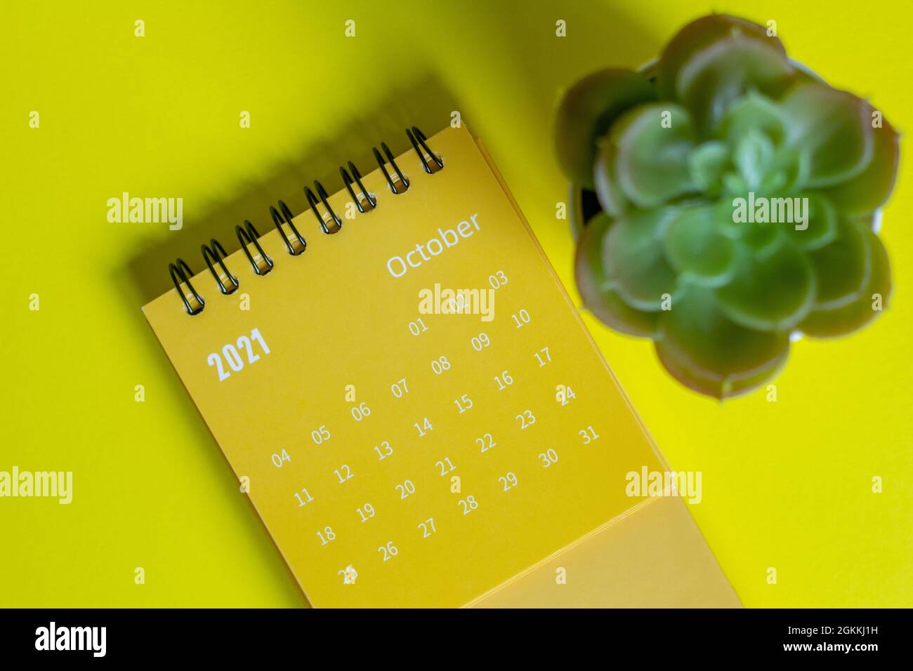 Calendar with tearoff sheets for October 2021. A desktop calendar for