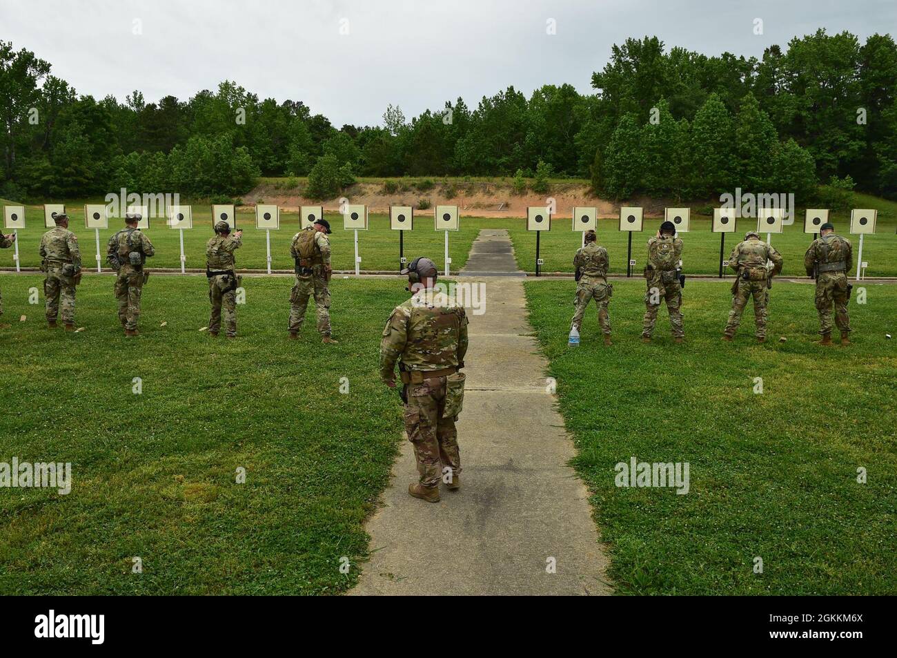 Camp Butner Ranges Competitors practice proper firing stance, weapon presentation and ...