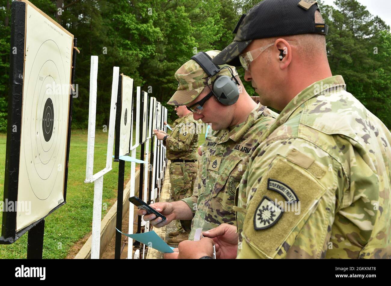 Competitors grade each other's scores May 18, 2021 during the 2021