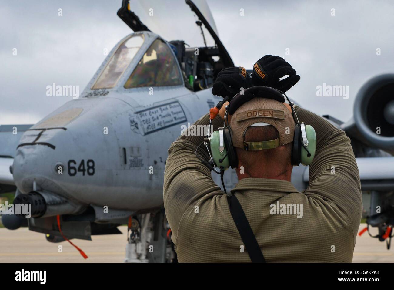 An Airman from the 354th Fighter Squadron signals an A-10 Thunderbolt ...