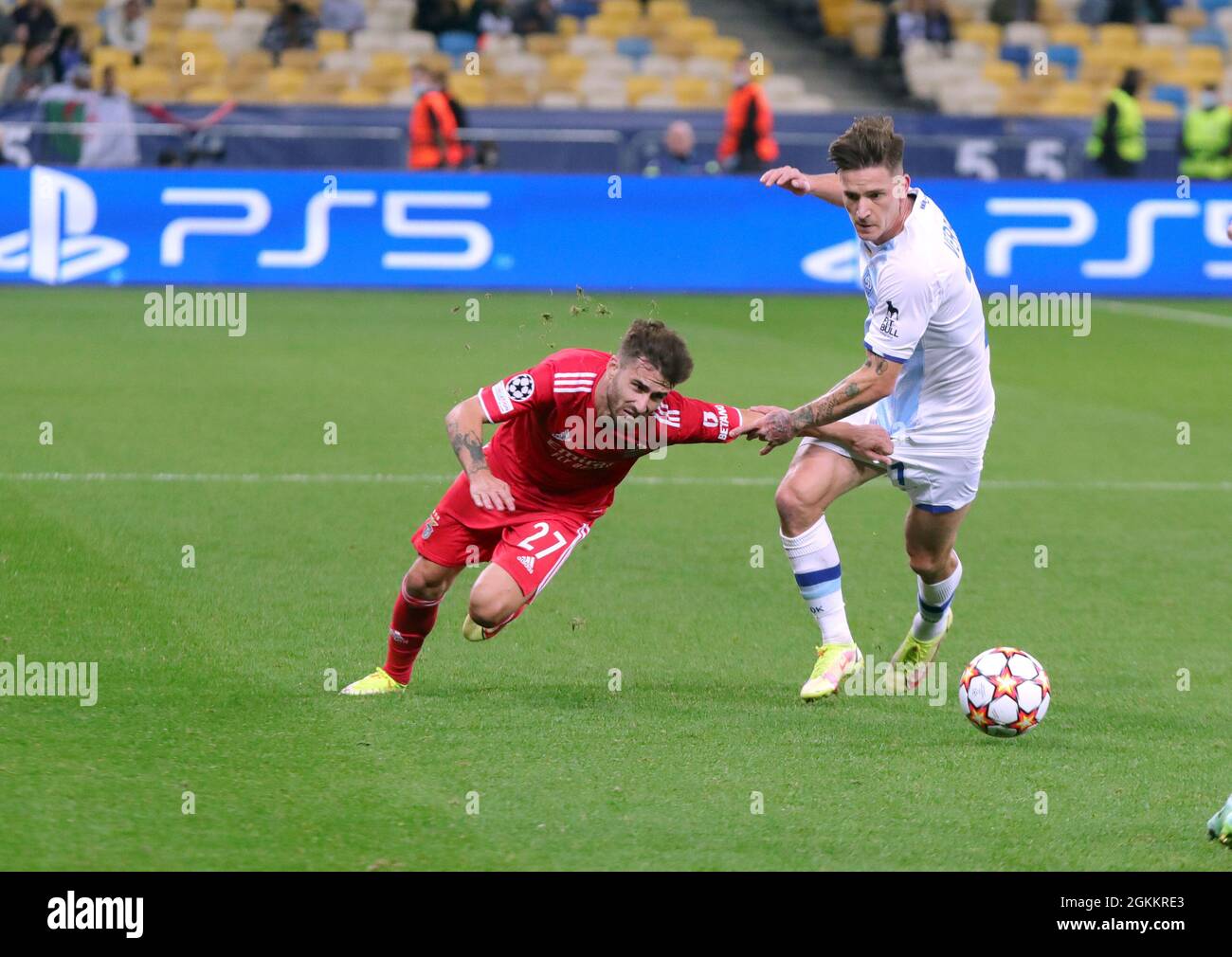 KYIV, UKRAINE - SEPTEMBER 14, 2021 - Players of FC Dynamo Kyiv Benjamin Verbych (R) and  S.L. Benfica Portugal Rafa Silva fight for the ball during the 2021/2022 UEFA Champions League Group E game which ended in a draw 0:0 at the NSC Olimpiyskiy in Kyiv, capital of Ukraine Stock Photo