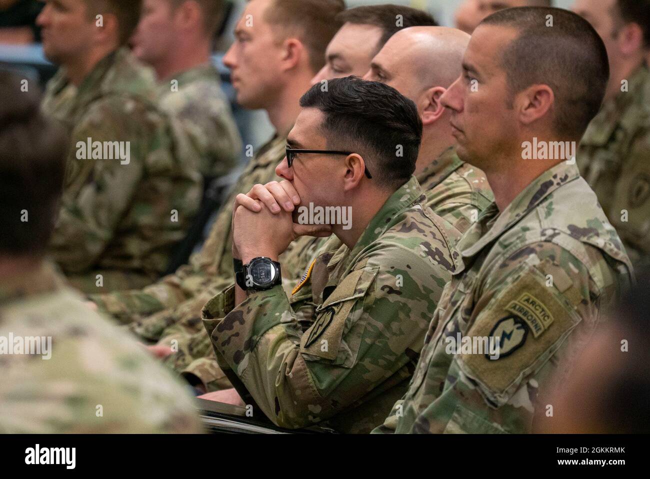 U.S. Army officers and first sergeants listen to