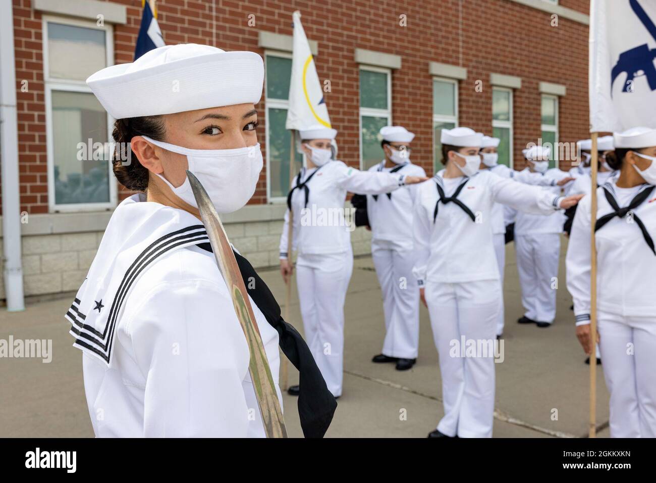Seaman Recruit Anisia Yang, a graduating recruit chief petty officer, stands before her assembled division at Recruit Training Command. More than 40,000 recruits train annually at the Navy's only boot camp. Stock Photo
