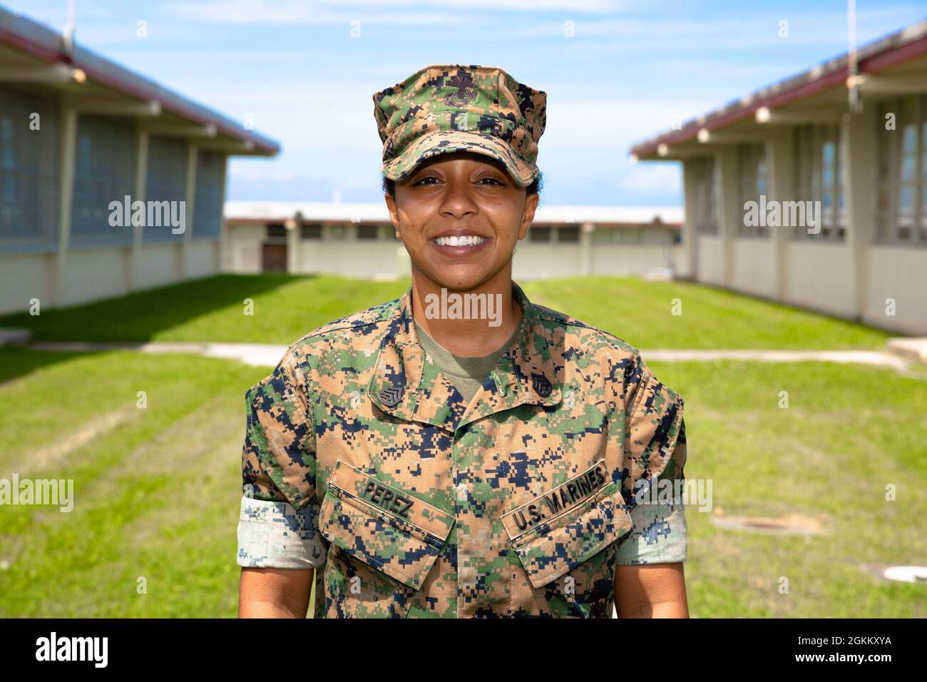 U.S. Marine Corps Staff Sgt. Aliyanna Perez, the battle center staff noncommissioned officer-in-charge, III Marine Expeditionary Force, poses for a photo on Camp Courtney, Okinawa, Japan, May 20, 2021.     “At the battle center, I started out as a watch chief,” said Perez. “The watch chief tracks all the incidents and current operations, and maintains cognizance of pretty much anything and everything within the MEF and its subordinate commands.”     Perez explained that the battle center is an information hub used for critical meetings and tracking crucial data throughout the Indo-Pacific regi Stock Photo