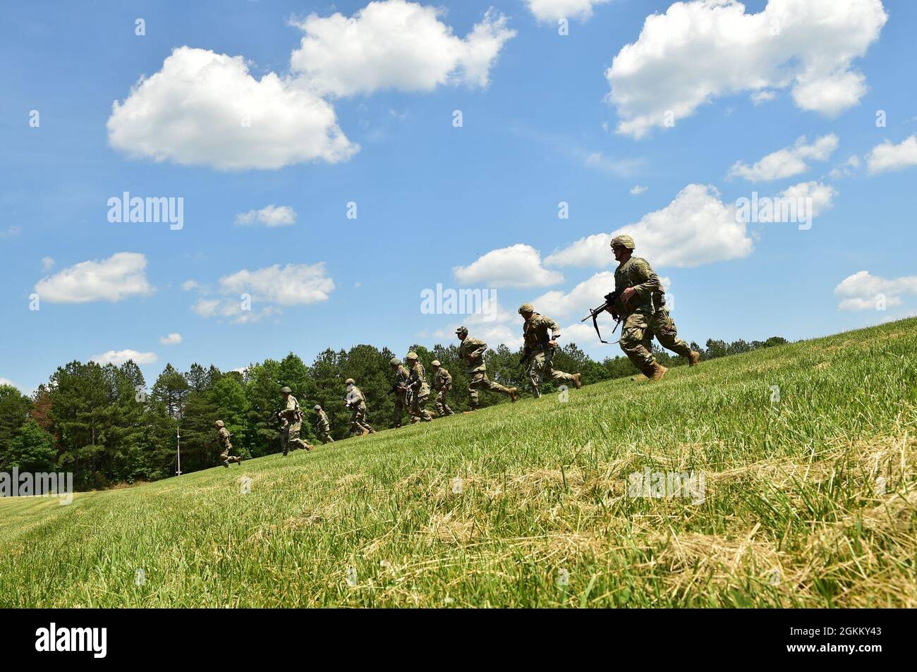 Camp Butner Ranges Competitors run to the next berm to re-engage their target May 20, 2021 ...