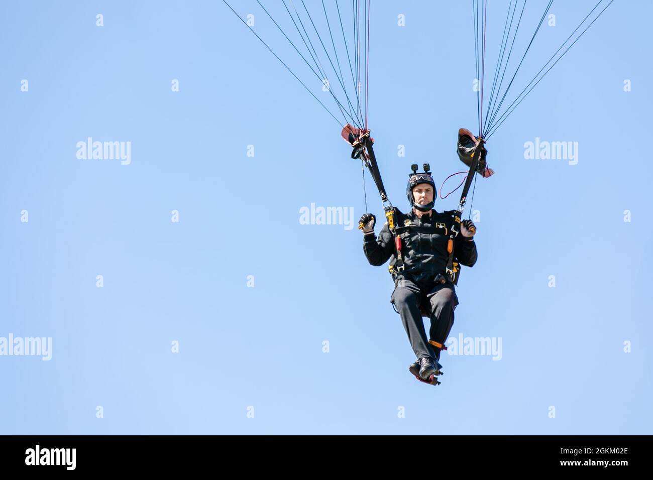 Sgt. 1st Class Keith Pierce makes a jump over Laurinburg-Maxton Airport. Stock Photo