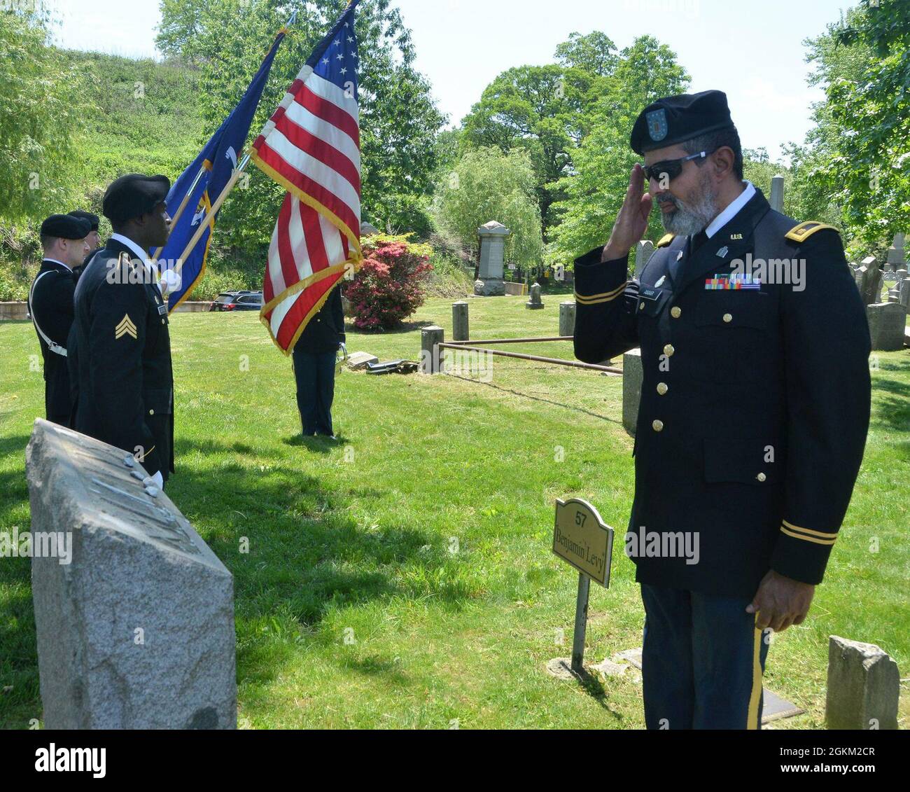 New York Army National Guard Chaplain (Maj.) Raziel Amar renders honors during a remembrance ceremony of Union Sgt. Benjamin Levy, the first Jewish American to receive the Medal of Honor, at his burial site at Cypress Hills Cemetery in Brooklyn, N.Y., May 21, 2021. Levy was a New York Soldier who received the Medal of Honor for his actions to save his regimental colors and rally his unit, the 1st New York Volunteer Infantry Regiment, during the Battle of Glendale in June 1862. Stock Photo