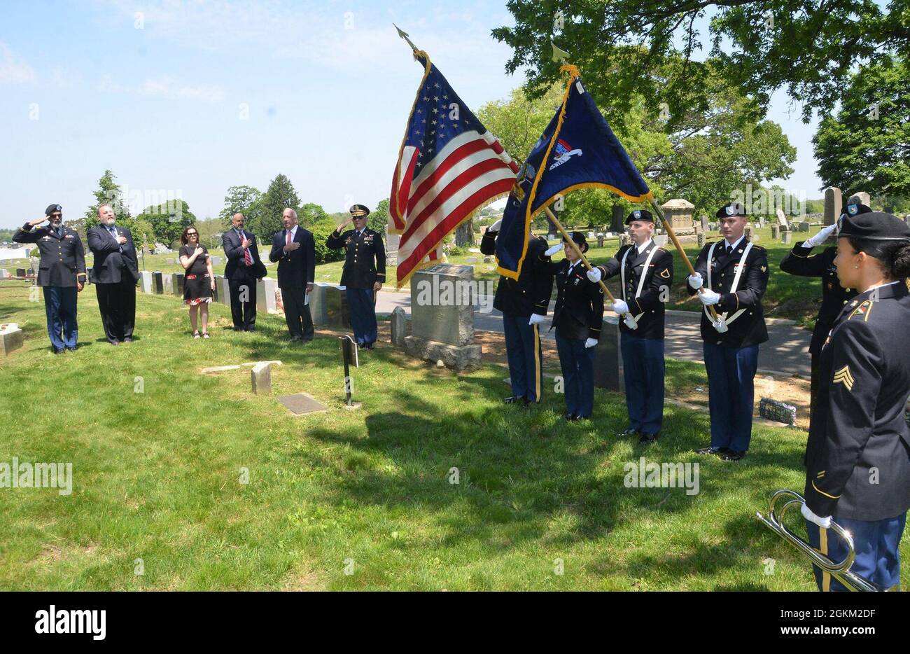 New York Army National Guard Soldiers assigned to the 107th Military Police Company present the colors and render honors to Union Sgt. Benjamin Levy, the first Jewish American to receive the Medal of Honor, at his burial site at Cypress Hills Cemetery in Brooklyn, N.Y., May 21, 2021. Levy was a New York Soldier who received the Medal of Honor for his actions to save his regimental colors and rally his unit, the 1st New York Volunteer Infantry Regiment, during the Battle of Glendale in June 1862. Stock Photo