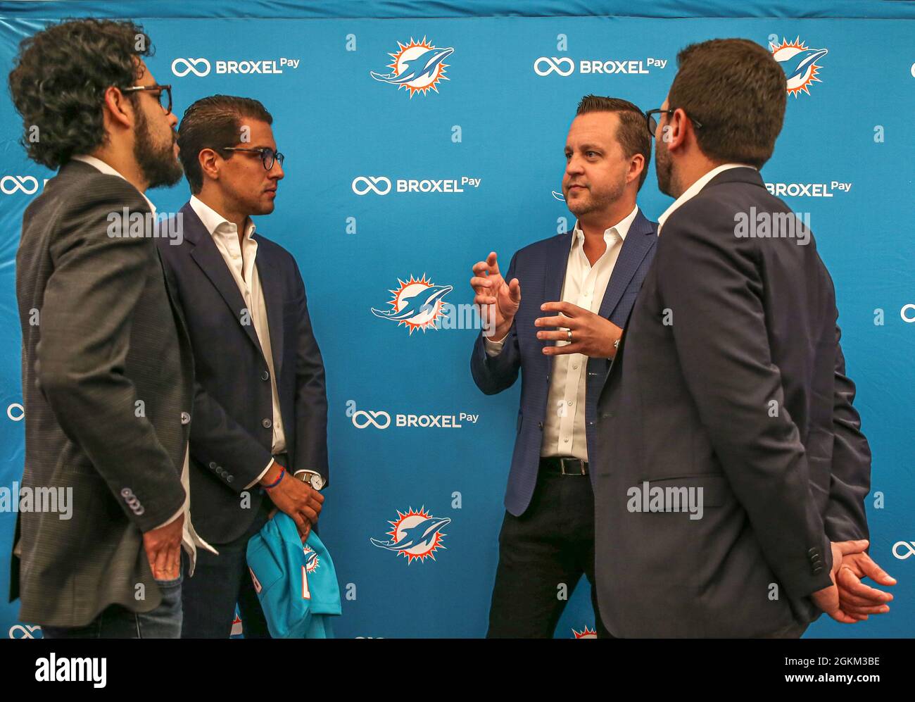 Miami, United States. 14th Sep, 2021. Tuesday, September 14, 2021; Miami,  FL. USA; Miami Dolphins Senior Vice President and Chief Revenue Officer,  Jeremy Walls, talks with Broxel CEO and founder Gustavo Gutierrez