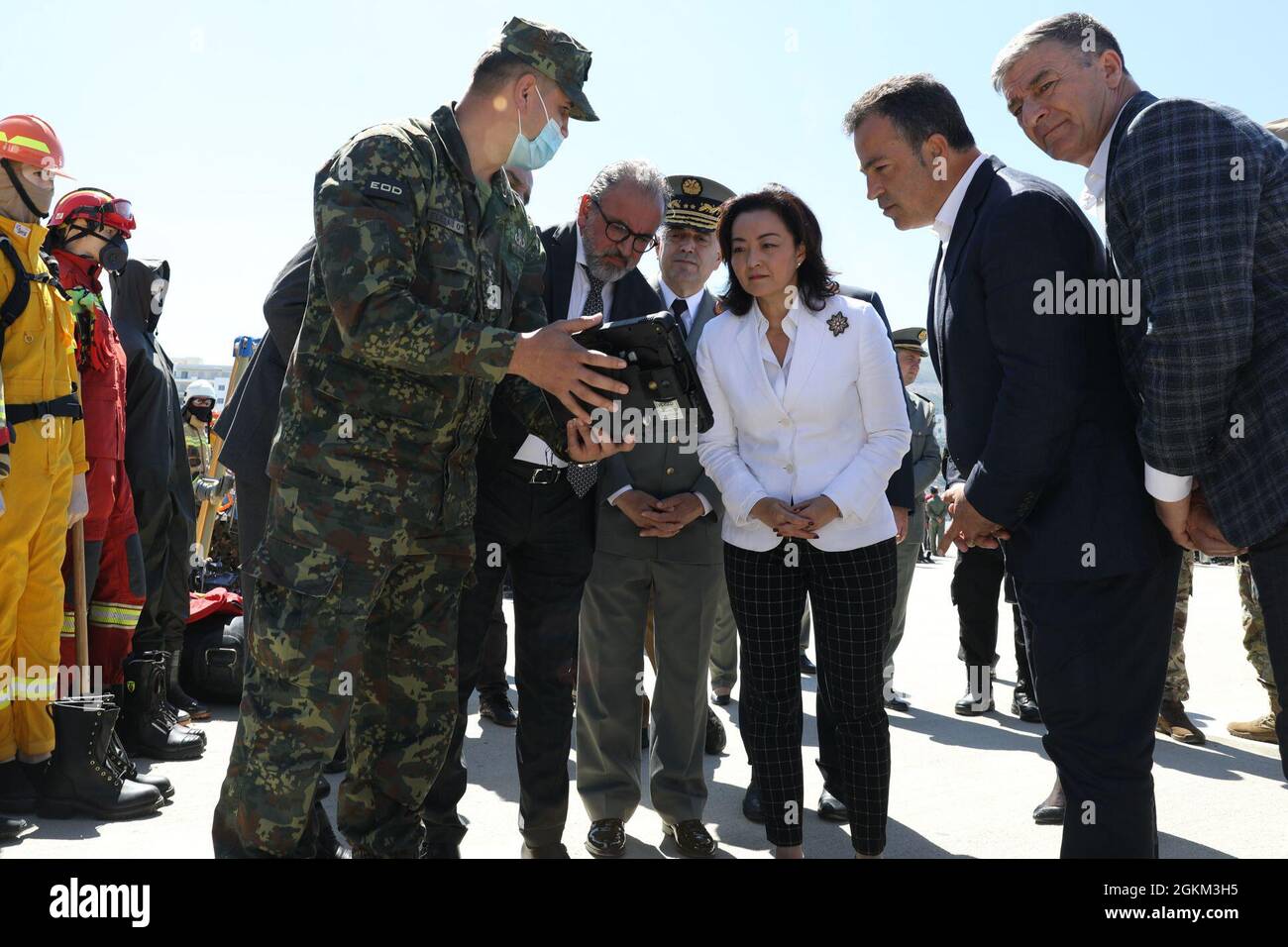 The Albanian Armed Forces Explosive Ordnance Disposal (EOD) unit shows U.S.-donated equipment to U.S. Ambassador to Albania Yuri Kim May 22, 2021, at a military sponsored open house in Vlore, Albania, held as part of DEFENDER-Europe 21 activities.  During the event, U.S. Ambassador to Albania Yuri Kim was briefed on the equipment and the continued U.S. commitment to peace and security in Albania, which includes decontamination of landmine and unexploded ordnance sites left over from previous conflict here. DEFENDER-Europe 21 is a large-scale U.S. Army-led exercise designed to build readiness a Stock Photo