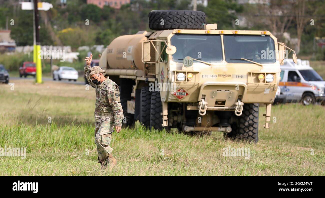 Sgt. 1st Class José Moneró directs a heavy expanded mobility tactical ...