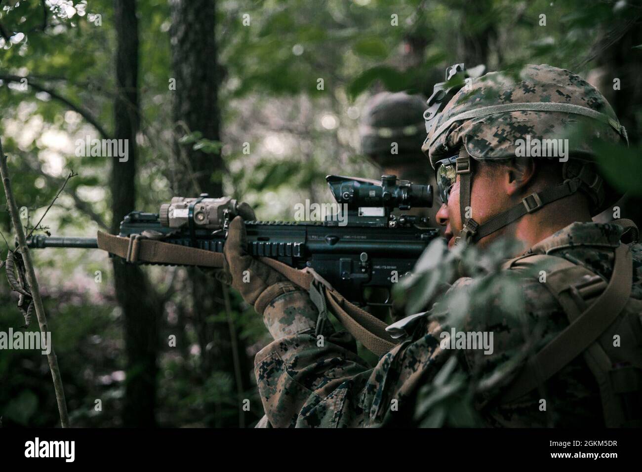 U.S. Marine Corps Pfc. Luis Reyes Quiterio, a Winston-Salem, N.C. native and a rifleman with 3rd Battalion, 2d Marine Regiment (3/2), 2d Marine Division, provides security during Exercise Raven 2-21 in Nashville, Tenn., May 22, 2021. Exercise Raven is an integrated training event with Marines from 3/2 and Marine Corps Forces Special Operations Command which simulates real-life tactical scenarios to enhance overall unit interoperability, effectiveness and lethality against an adversarial force. Stock Photo