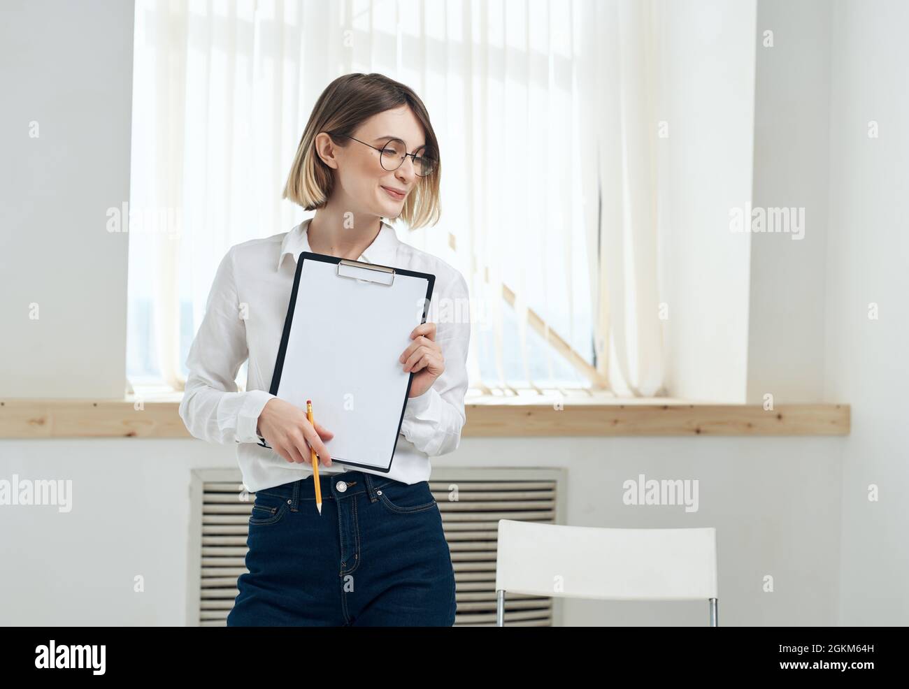 Business woman in white shirt office secretary working Stock Photo - Alamy