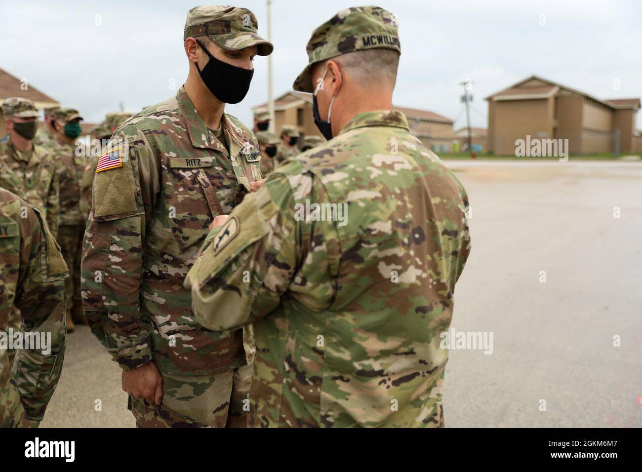 Luke Ritz, engineer officer, Headquarters and Headquarters Company, 67th Maneuver Enhancement Brigade, is promoted to the rank of major in the Nebraska Army National Guard, May 23, 2021, during pre-deployment training at Fort Hood, Texas. Ritz was promoted by Lt. Col. Charles McWilliams, brigade operations officer. Stock Photo