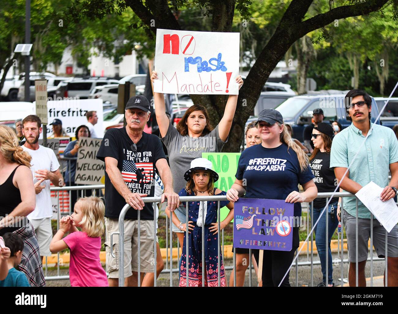 Deland, United States. 14th Sep, 2021. People hold placards outside a meeting of the Volusia County School Board in Deland. The school board voted 3-2 to modify the mandatory school mask requirement to allow parents to opt out of the requirement for their children. (Photo by Paul Hennessy/SOPA Images/Sipa USA) Credit: Sipa USA/Alamy Live News Stock Photo