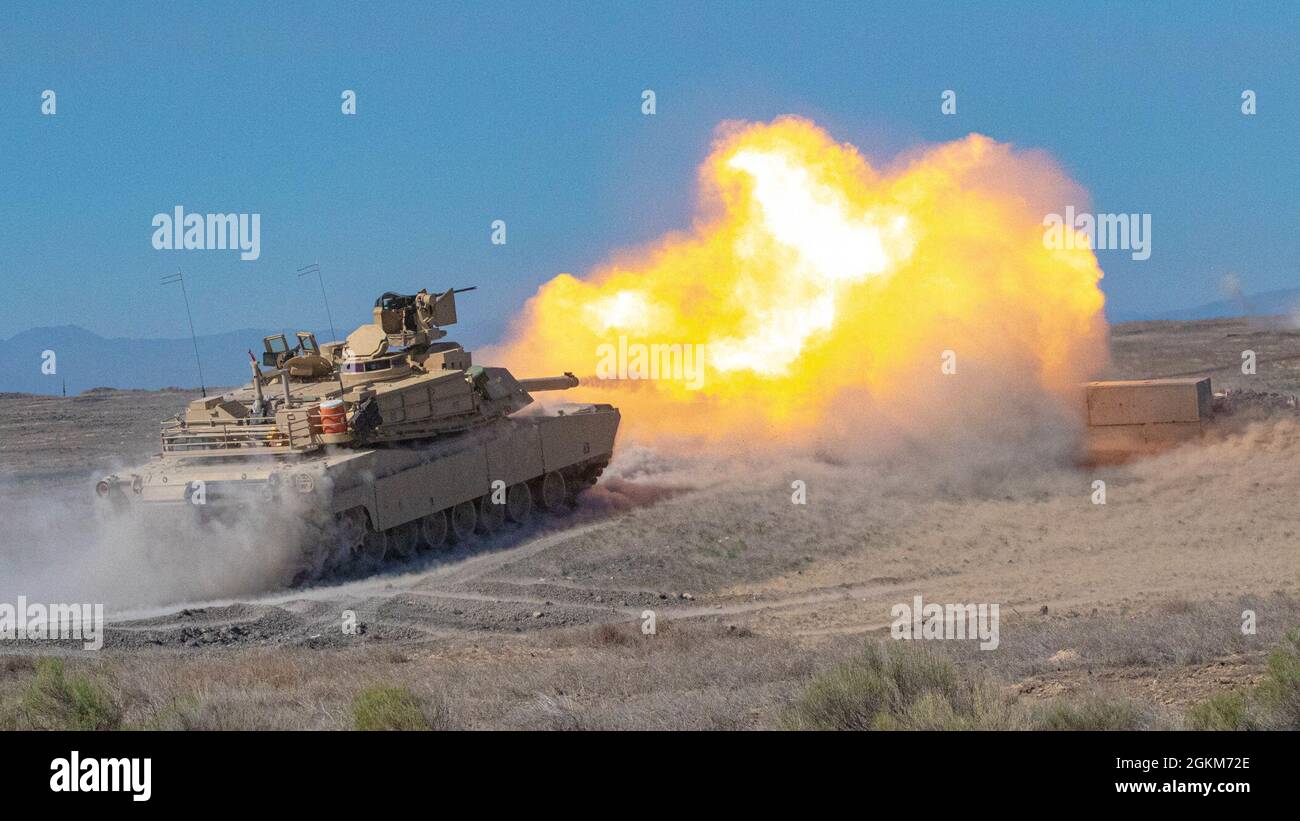 Oregon Army National Guard M1A2 Abrams battle tank with Alpha Troop, 3rd Squadron, 116th Cavalry Regiment, engages a target at a firing range during annual training at the Orchard Combat Tranining Center near Boise, ID,  June 19, 2021.   Soldiers trained in their military occupational specialties during annual training. Stock Photo