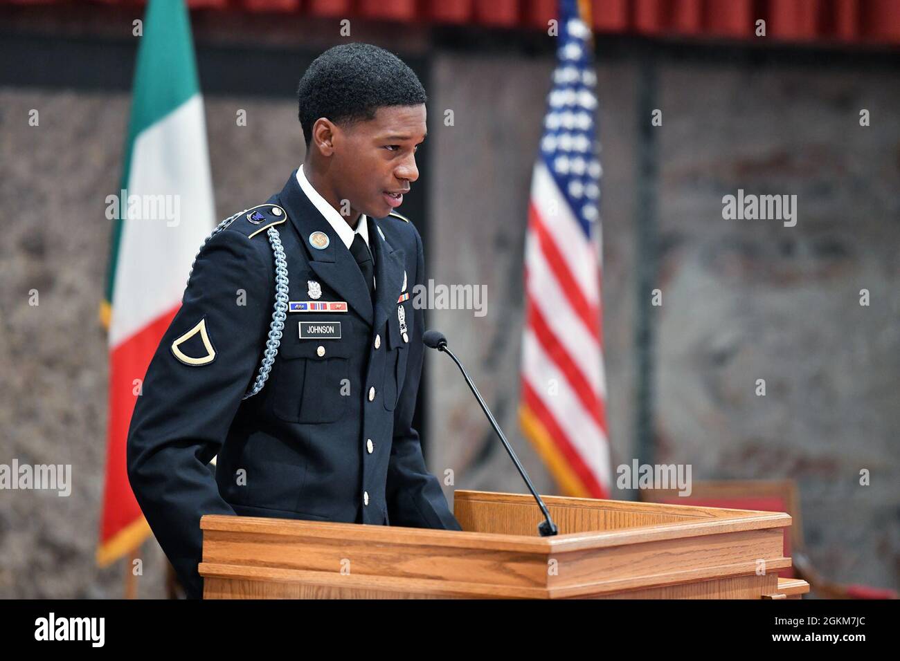 U.S. Army Paratrooper Pvt. Tywan Johnson assigned to the 1st Battalion, 503rd Infantry Regiment, 173rd Airborne Brigade addresses soldiers and friends during a memorial service for Pfc. Ian N. Morosoff, who died May 1 from injuries sustained in a car accident, Caserma Ederle, Vicenza, Italy, May 24, 2021. Stock Photo