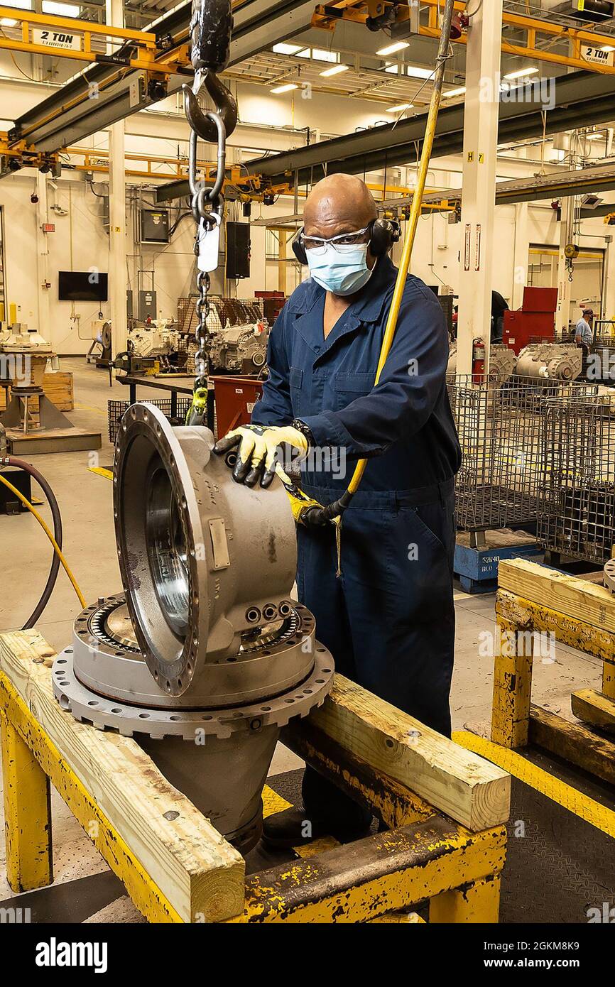 At Anniston Army Depot, a heavy mobile equipment mechanic, disassembles