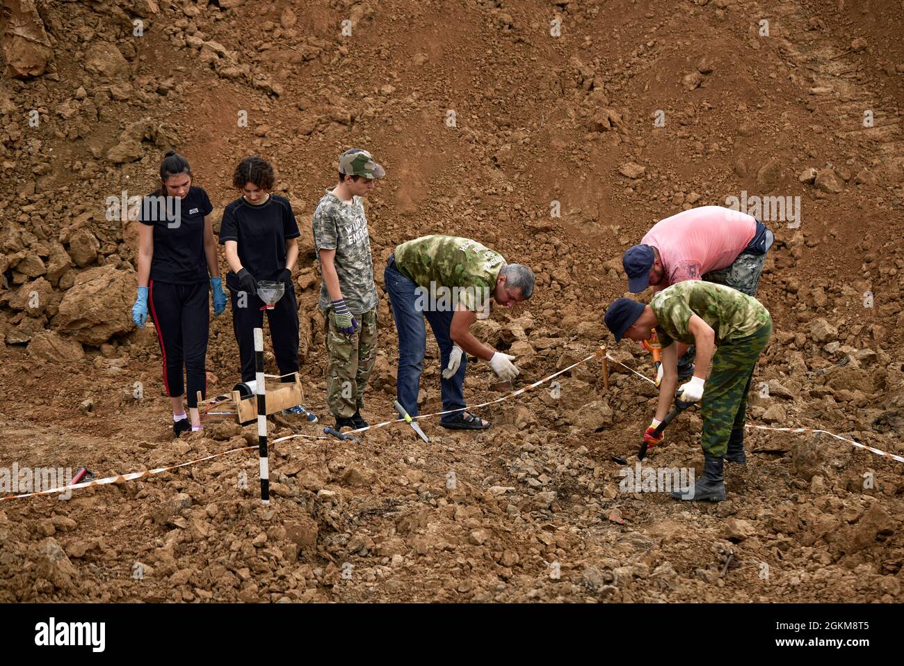 Excavations at the site of a war crime. Site of a mass shooting of ...