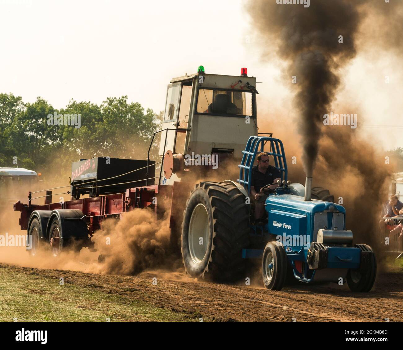 Tractor pulling contest showing huge exhaust fumes at a steam rally in