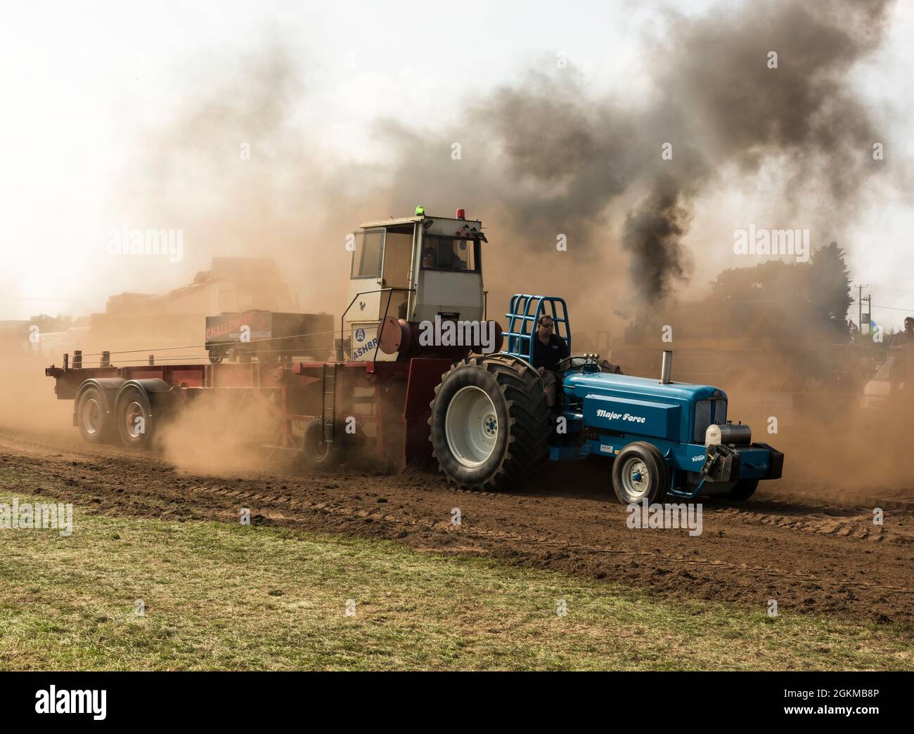 Tractor pulling contest showing huge exhaust fumes at a steam rally in