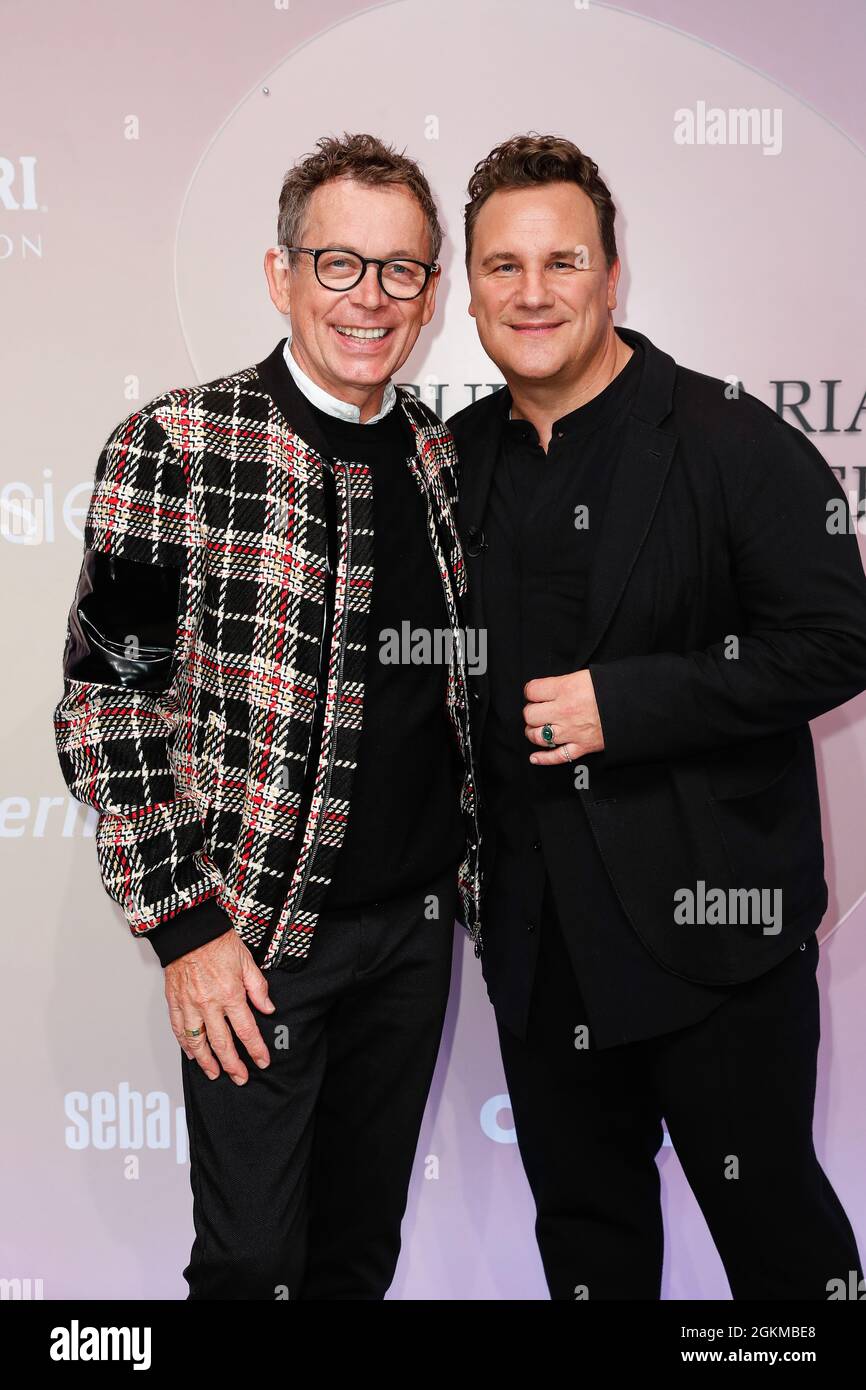 Berlin, Germany. 14th Sep, 2021. Frank Mutters (l) and husband Guido Maria Kretschmer arrive at the Guido Maria Kretschmer show at Kraftwerk. About You, or Re-Fashion Week, has been part of Berlin Fashion Week since 2021. About You Fashion Week runs from 11 to 15 September 2021. Credit: Gerald Matzka/dpa/Alamy Live News Stock Photo