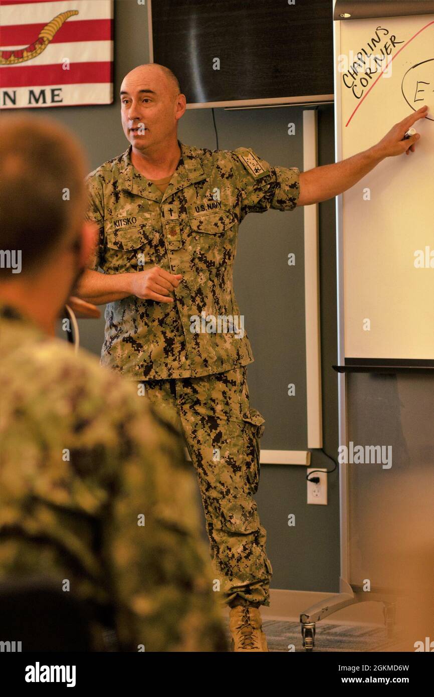 210525-N-N0484-0011 MONTEREY, Calif. (May 25, 2021) – Navy Chaplain Lt. Cmdr. Mark Kitsko coaches Information Warfare Training Command (IWTC) Monterey Sailors on mental toughness and resiliency. IWTC Monterey, as part of the Center for Information Warfare Training (CIWT), provides a continuum of foreign language training to Navy personnel, which prepares them to conduct information warfare across the full spectrum of military operations. Stock Photo