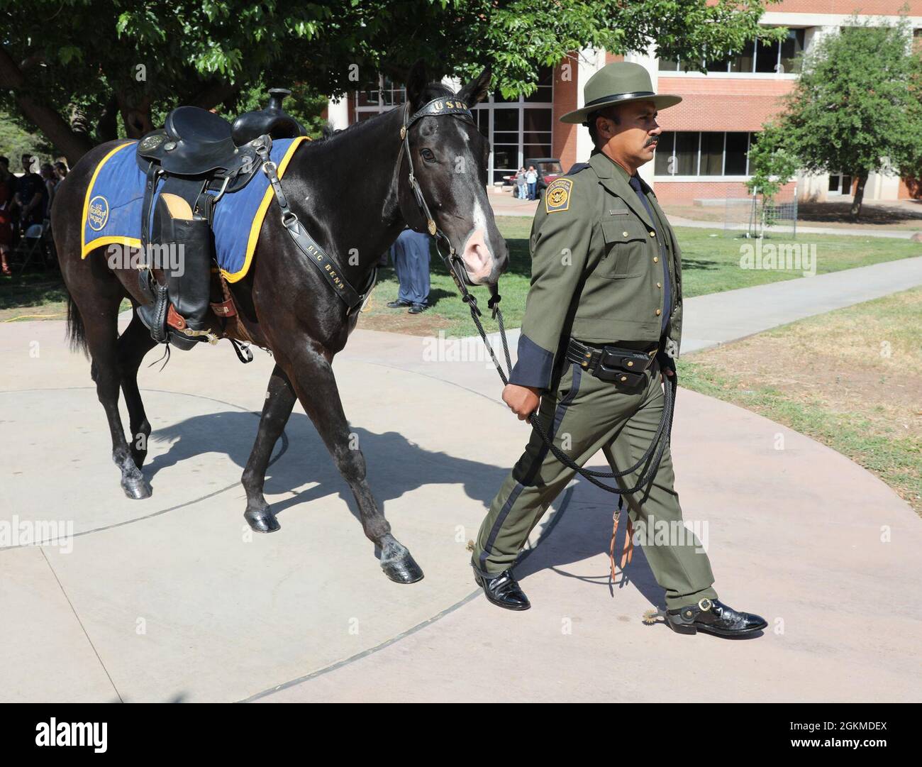 Border Patrol agent Leeroy Amaya, Sierra Blanca Border Patrol Station, leads 'Trigger' during