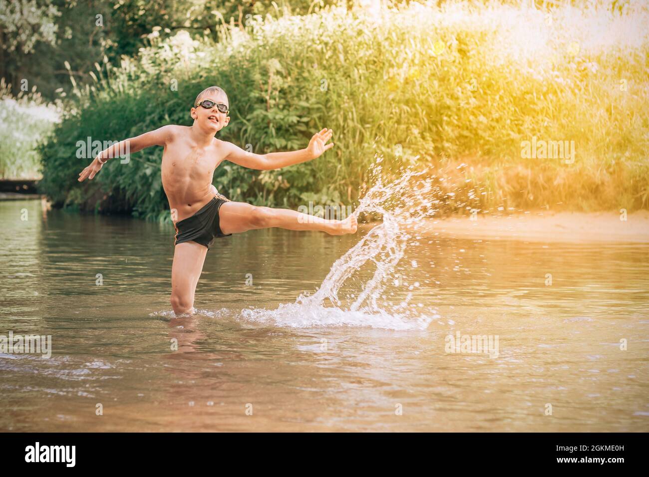 Girl jumping in river hi-res stock photography and images - Alamy